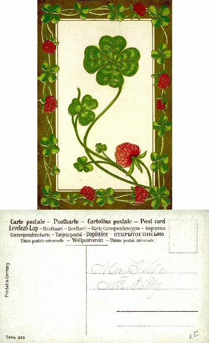 Four-Leaf Clover and Red Blossoms