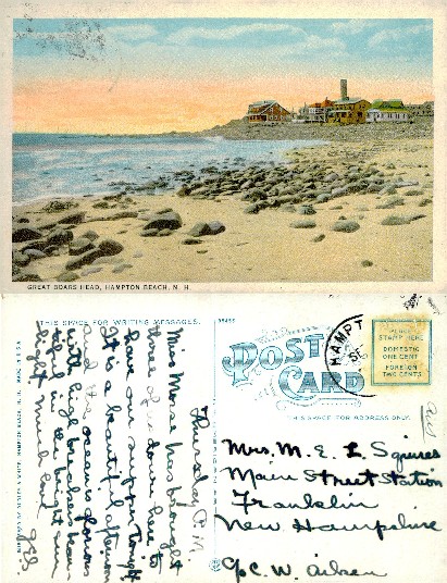 Rocky Beach with Buildings on Headland