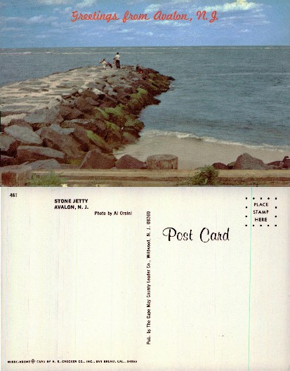 Stone Jetty with People Fishing