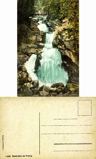 Waterfalls in forested canyon