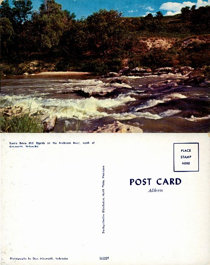 River Rapids and Forested Hills
