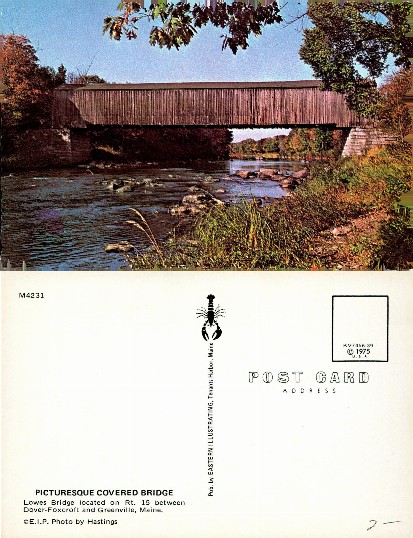 Covered Wooden Bridge over River