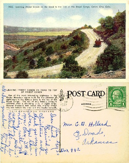 Automobile on road, mountain gorge