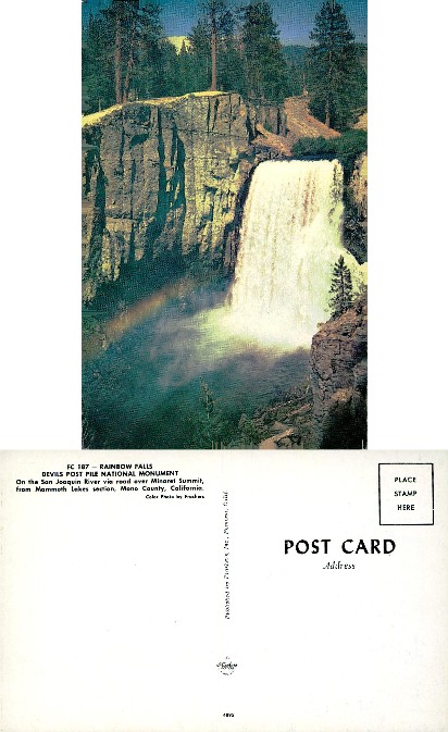 Waterfall with Rainbow and Cliffs