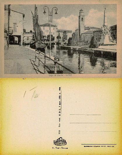 Harbor view with boats and bell tower