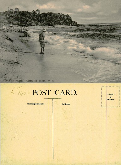 Person on Beach at Rocky Coast