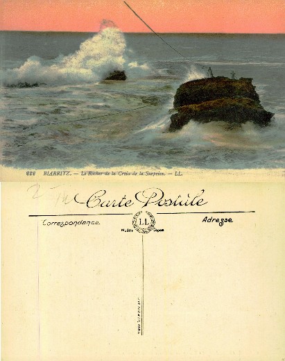 Rocky Coastline with Waves and Cross