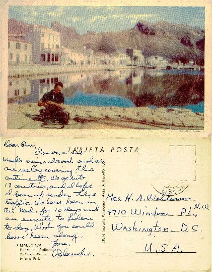 Man on dock, harbor and mountains