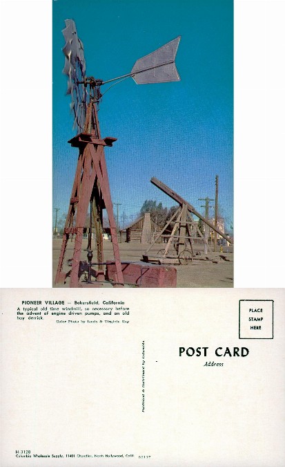 Old Windmill and Hay Derrick