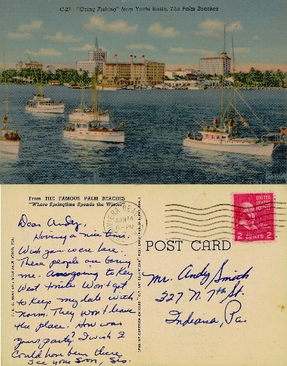 Yachts in Harbor with City Buildings