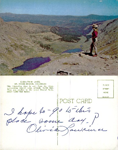 Woman overlooking mountain lakes and valley
