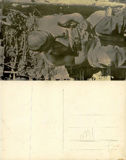 Soldier Resting with Pipe in Trench