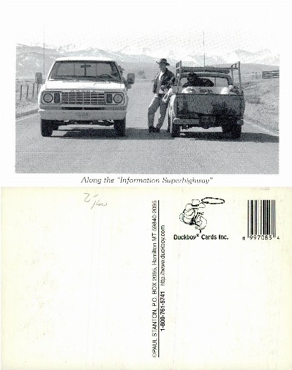 Men and Trucks on a Mountain Road