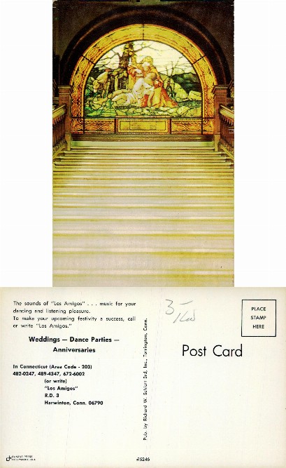 Grand Staircase with Stained Glass Window