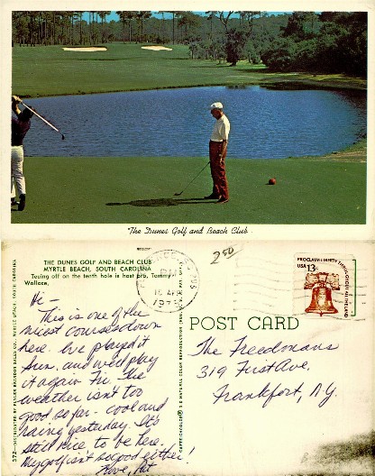 Golfers on Golf Course with Pond