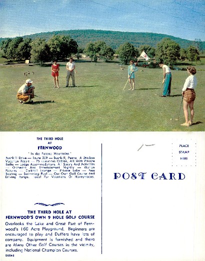Golfers on resort golf course