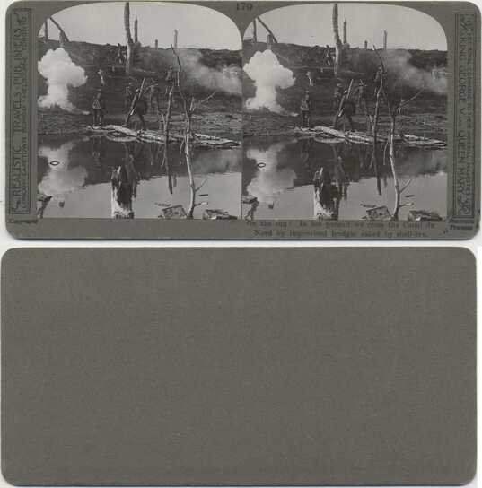 Soldiers crossing shell-raked canal
