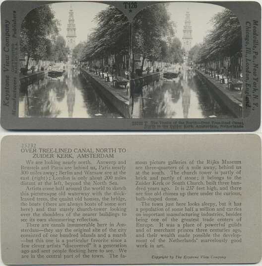 Tree-Lined Canal with Church Tower