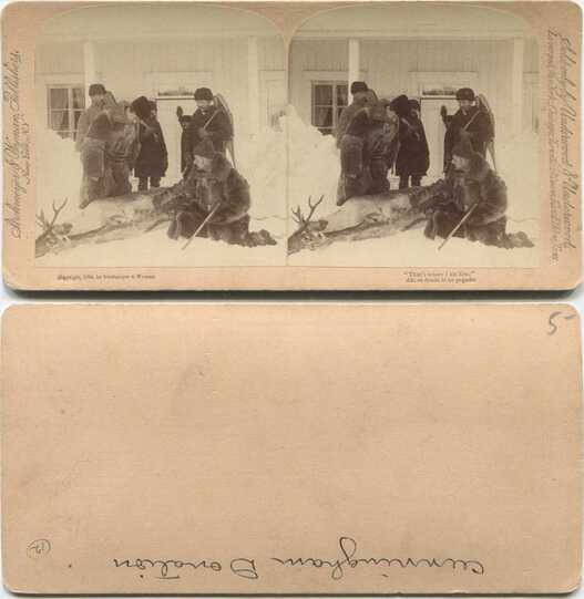 Hunters with Killed Deer in Snow