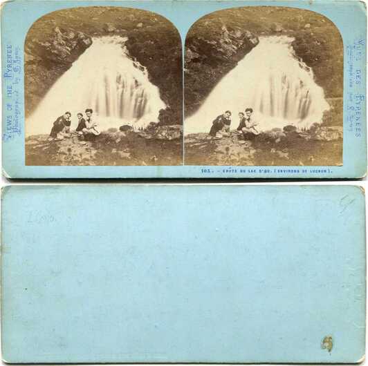Waterfall and three men