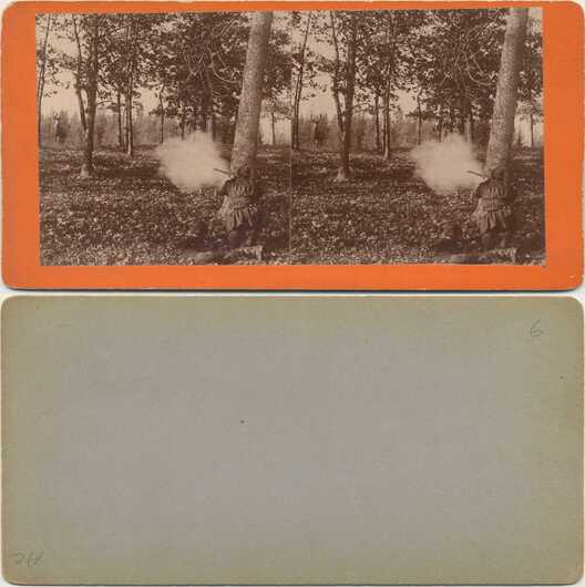 Hunter Shooting Deer