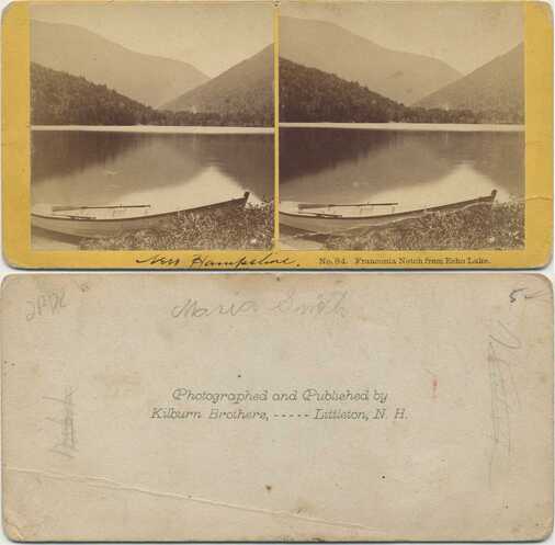 Boat on Echo Lake with Mountains
