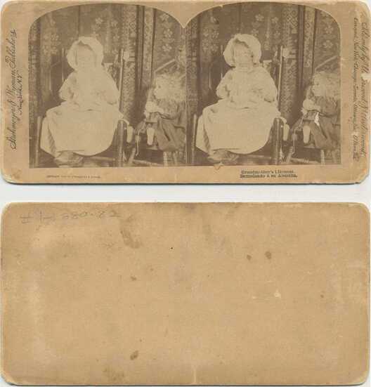 Child & Doll in Rocking Chairs