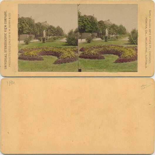 Park with Flower Beds and Statue