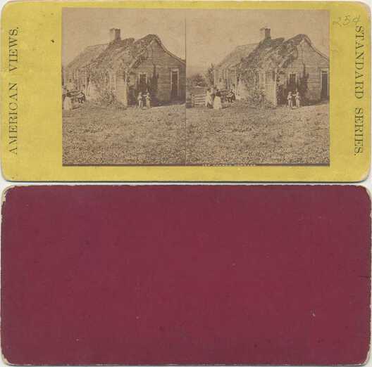 Ivy Covered Rustic Cottage with People