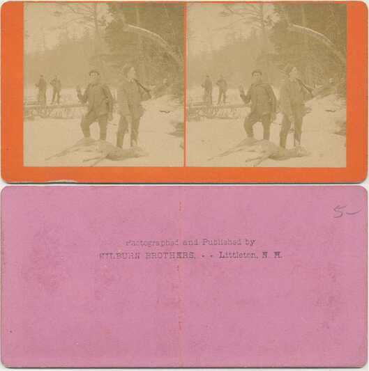 Hunters with deer in winter forest