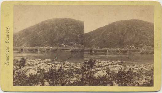 Bridge Crossing a Mountain River
