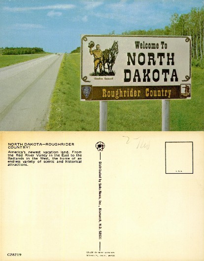 North Dakota Welcome Sign on Road